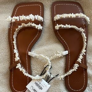 Zara sea shell sandals flat! New with tag never been worn size 7 1/2 or 38.